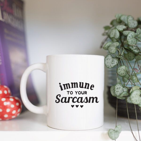 Immune to your sarcasm mug
